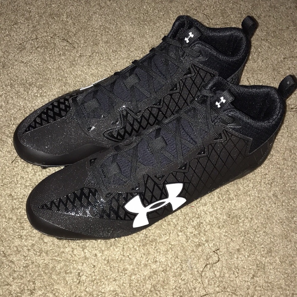 Under Armour Nitro Select Mid Cleats. All black.